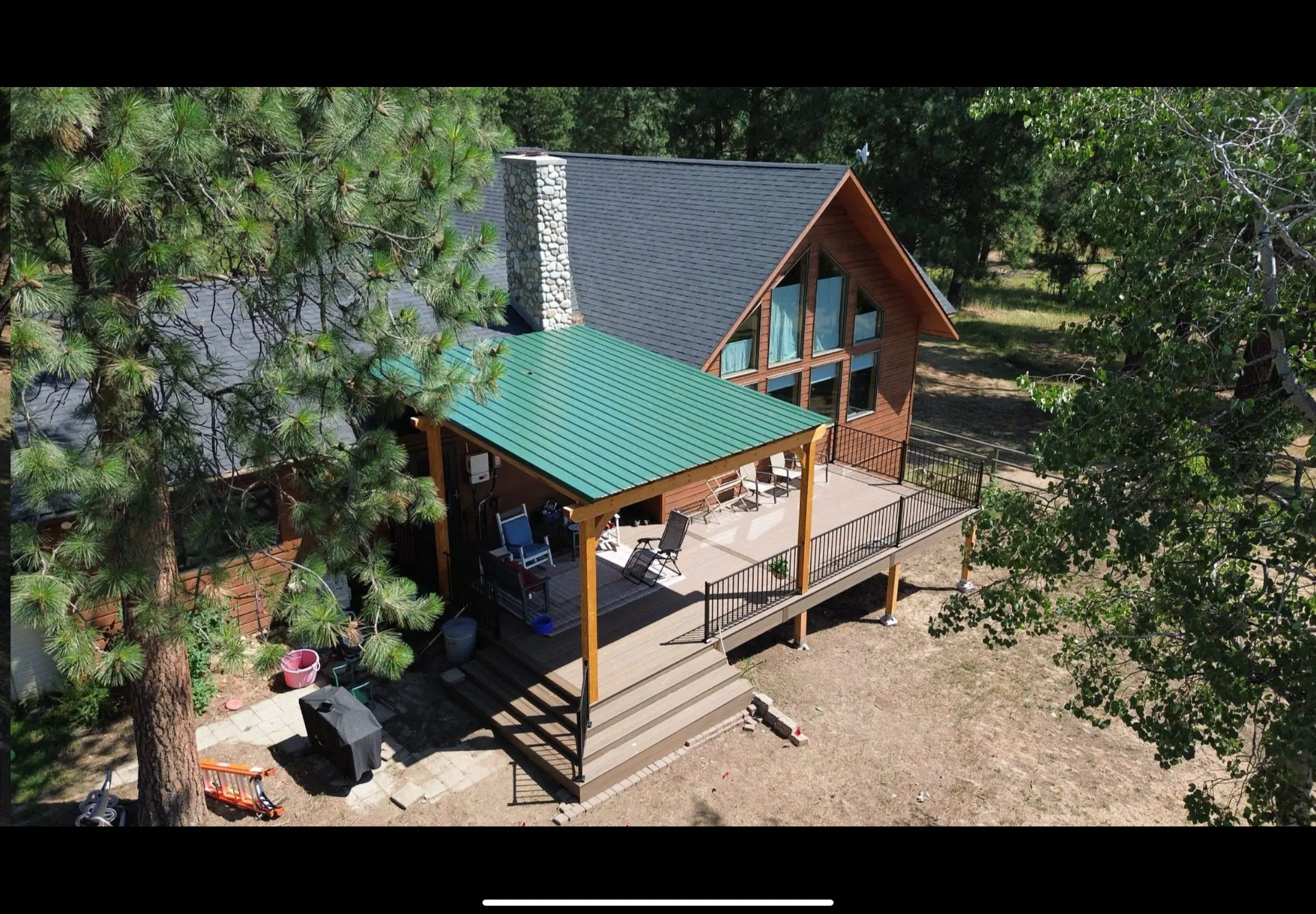 Timber Cover with Green Metal Roof