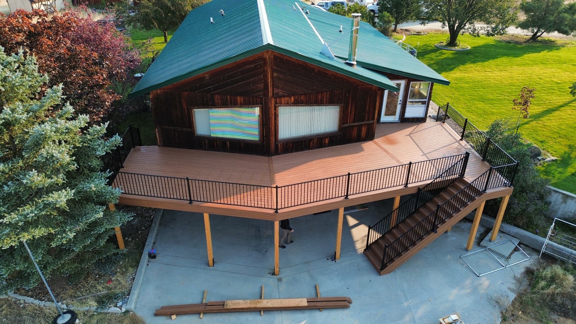 Curved Two-Story Deck & Under-Deck Patio